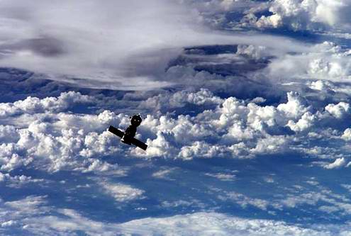Space travel critical situations - outer space ship on Earth orbit photo