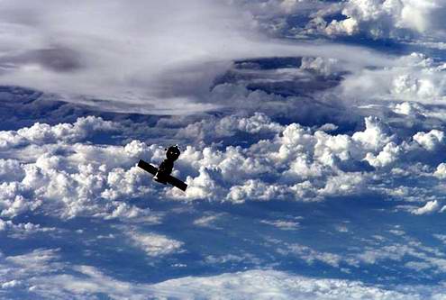 pictures of earth from outer space. Space travel critical situations - outer space ship on Earth orbit photo